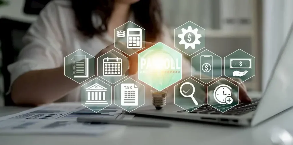 Modern Payroll Management Concepts with Financial Icons Overlaying a Laptop 